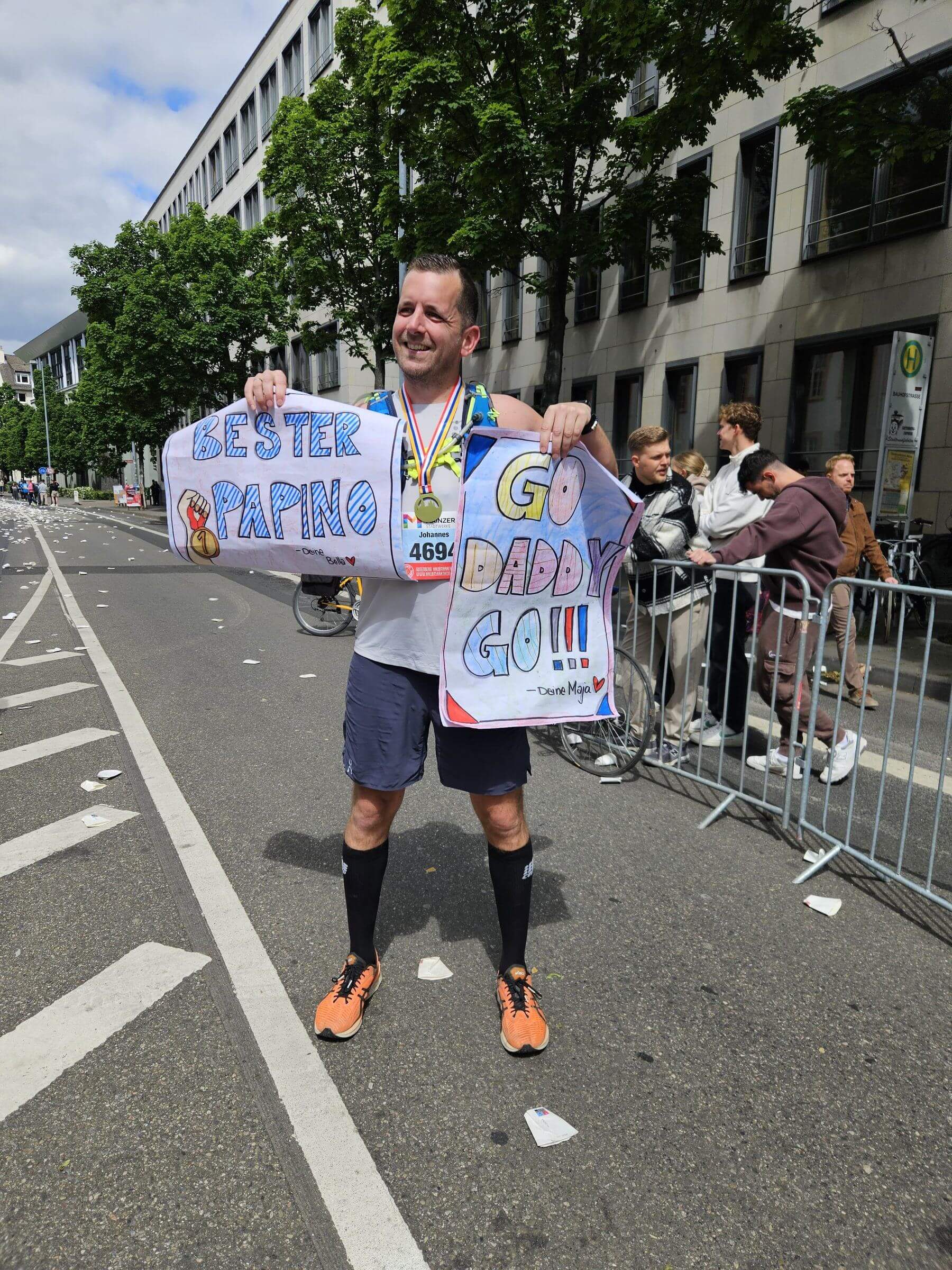 Johannes at the finish line of a half marathon
